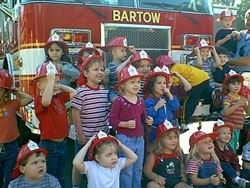 Kids in front of fire truck