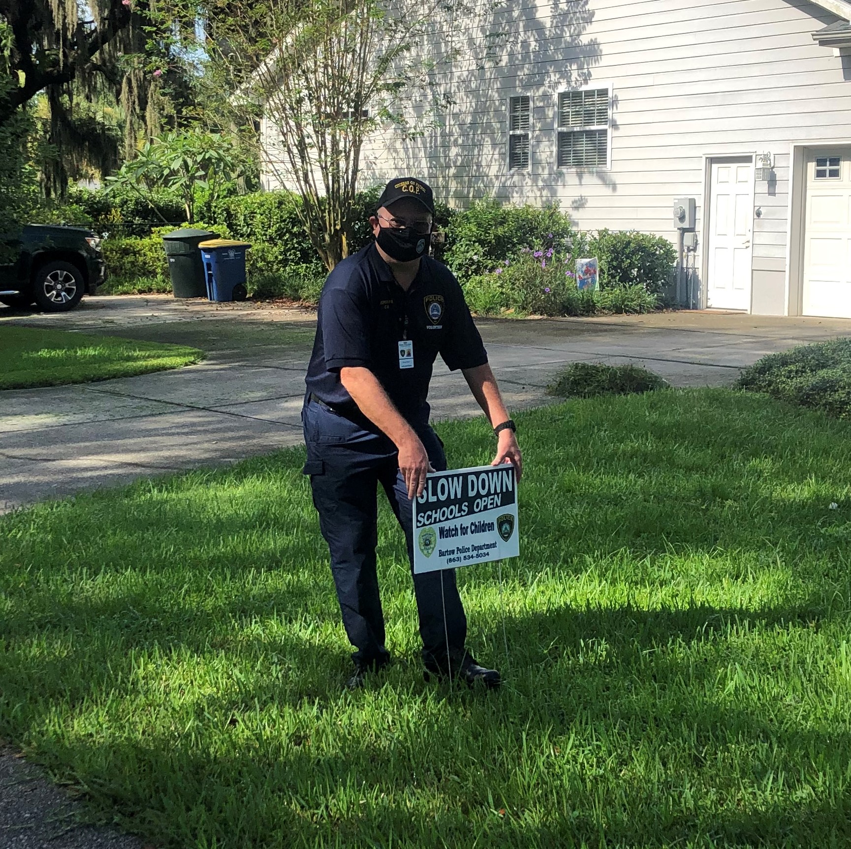 Man Holding Sign